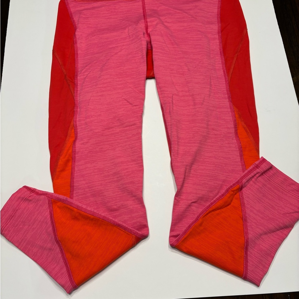 OUTDOOR VOICES LEGGINGS YOGA PANTS
SIZE MEDIUM 70s COLORS PINK & ORANGE